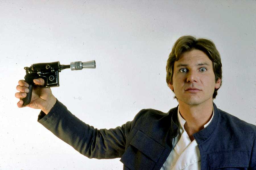 Harrison Ford et son pistolaser © Photo sous Copyright
