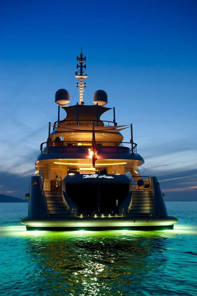 Isa yacht - beautiful picture with green underwater lights for this mega yach (Copyright photo : DR) 
